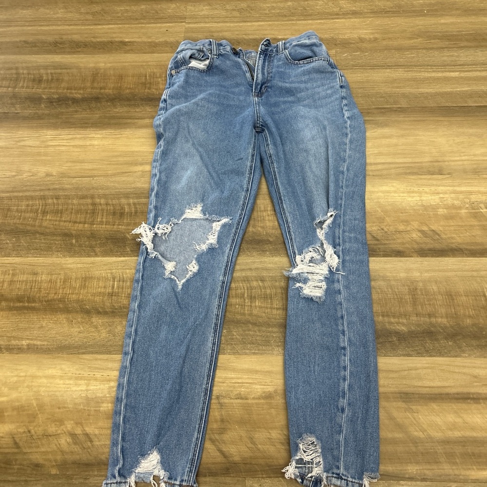 Distressed Blue Jeans